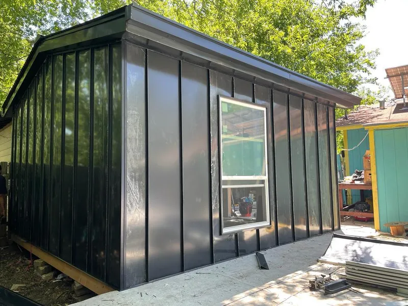 Black standing seam metal wall panels for Metal Roof Installation in Luling