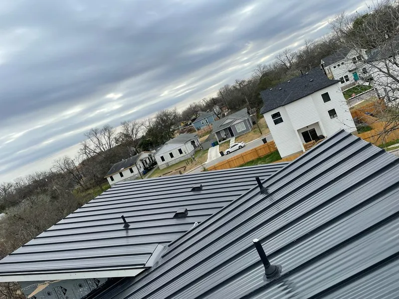 Standing seam metal roof panels with vents for Skylight Repair in Luling